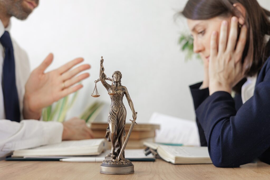 two lawyers or partners check the contract. legal advice in the office or online. a European female